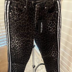 Make a statement in these one of a kind NWT Black Orchid Jeans.